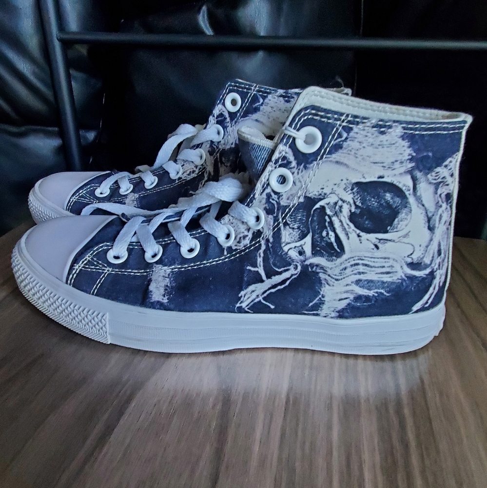 1. RAAD High-Top Skull Sneakers - Unisex